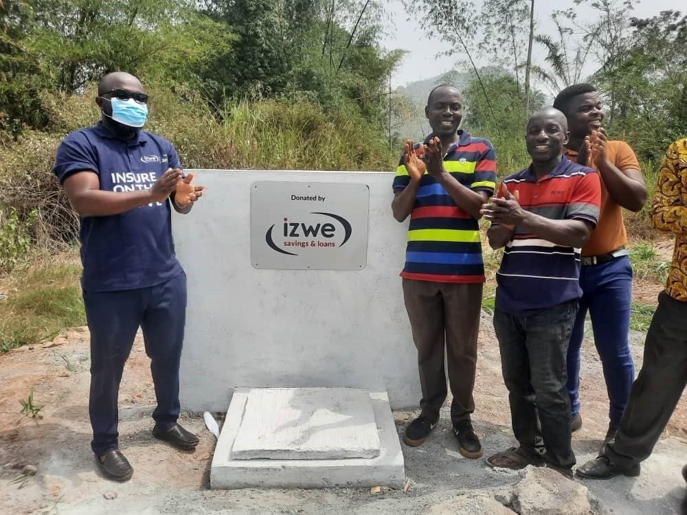 Izwe Savings & Loans builds mechanized borehole for Manya Krobo Community that relied on contaminated stream for water