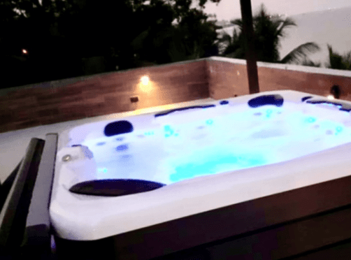 Toast a cocktail to sunset in a rooftop Jacuzzi at Kokrobite