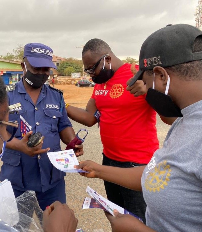 Rotary Club of Tema Community 25 shares nose masks at Old Ningo Market Square