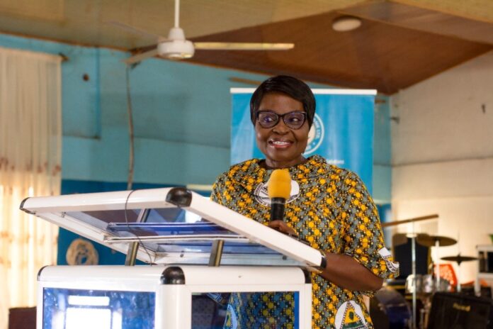 Mrs Comfort Owusu, Executive Director of Association of Rural Banks, Ghana addressing women at the durbar organized by Akuapem Rural Bank PLC women particularly in the peri-urban and smaller communities to take advantage of rural banks’ microfinance scheme to strengthen their financial independence.
