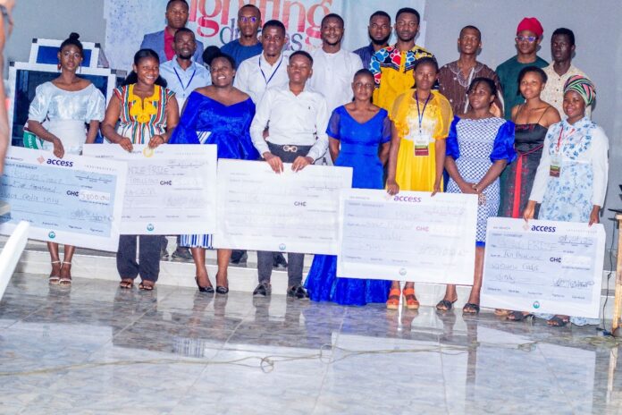 Young entrepreneurs receiving cash prizes during the 2023 Igniting Dreams programme to scale their business ventures