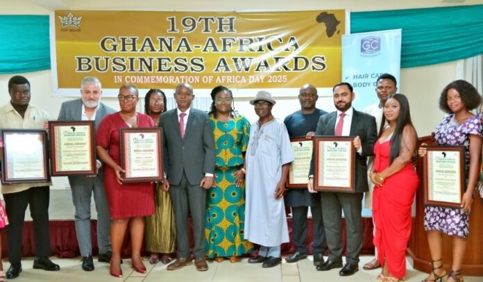 A group picture of some Award Winners with Mrs. Nana Kraah