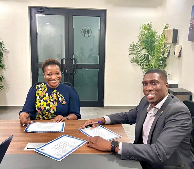 Maud Lindsay-Gamrat, CEO of Atlantic Catering, right, with Tolu Lacroix, Executive Director of UN Global Compact Ghana, right during the signing ceremony