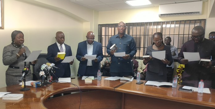 A cross-section of the 9-member governing board of GEXIM Bank being sworn in by the Minister of Trade